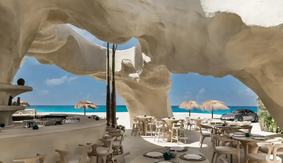Escā Playa on Egypt's Mediterranean coast, shaped by Cairo architect Mohamed Badie. Mineral coatings and coral structures let the room read as a continuation of the shore. Photo © Nour El Refai.